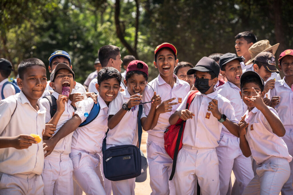 school kids posing for a picture in Sri Lanka